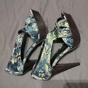 Women size 9- 4 in heels. Tropical theme.